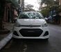 Hyundai Grand i10   2014 - Cần bán Hyundai Grand i10 đời 2014, màu trắng, xe đẹp