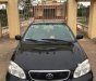 Toyota Corolla altis 1.8G MT 2003 - Bán Toyota Corolla altis 1.8G MT đời 2003, màu đen số sàn, giá chỉ 243 triệu