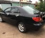 Toyota Corolla altis 1.8G MT 2003 - Bán Toyota Corolla altis 1.8G MT đời 2003, màu đen số sàn, giá chỉ 243 triệu