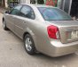 Daewoo Lacetti 1.6 2005 - Cần bán lại xe Daewoo Lacetti 1.6 đời 2005, màu vàng