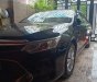 Toyota Camry 2016 - Bán xe Toyota Camry 2016, màu đen đã đi 31000km, giá chỉ 900 triệu