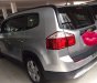 Chevrolet Orlando 2013 - Cần bán gấp Chevrolet Orlando sản xuất năm 2013, màu bạc như mới