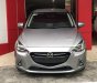 Mazda 2 2016 - Bán xe Mazda 2 năm sản xuất 2016, màu xám, xe gia đình