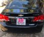 Chevrolet Cruze   2010 - Bán Chevrolet Cruze đời 2010, màu đen, số sàn