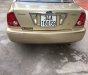 Ford Laser 2002 - Can bán xe Fors Laser Duluxe 2002 màu vàng cát chính chủ