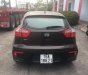 Kia Rio   1.4 AT  2014 - Chính chủ bán Kia Rio 1.4 AT năm 2014, màu nâu, nhập khẩu