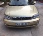 Ford Laser 2002 - Can bán xe Fors Laser Duluxe 2002 màu vàng cát chính chủ