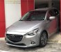 Mazda 2 2016 - Bán xe Mazda 2 năm sản xuất 2016, màu xám, xe gia đình