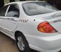 Kia Spectra   2004 - Cần bán gấp Kia Spectra đời 2004, màu trắng, xe nhập chính chủ