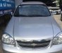 Chevrolet Lacetti MT 2012 - Cần bán gấp Chevrolet Lacetti MT năm 2012, màu bạc giá cạnh tranh