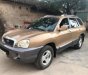 Hyundai Santa Fe Gold 2.0 AT 2003 - Bán Hyundai Santa Fe Gold 2.0 AT đời 2003, màu vàng, nhập khẩu nguyên chiếc 