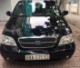 Kia Carnival 2005 - Bán ô tô Kia Carnival 2005, màu đen, giá chỉ 235 triệu