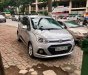 Hyundai Grand i10 1.2 AT 2015 - Cần bán Hyundai Grand i10 1.2 AT 2015, màu bạc, xe nhập