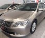 Toyota Camry 2.0E 2013 - Bán xe Toyota Camry 2.0E đời 2013, màu nâu vàng