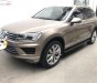 Volkswagen Touareg 3.6 AT 2016 - Bán Volkswagen Touareg 3.6 AT 2016, màu vàng, xe nhập như mới