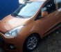 Hyundai Grand i10   2015 - Bán Hyundai Grand i10 đời 2015, màu nâu, nhập khẩu