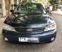 Ford Laser Ghia 1.8 AT 2005 - Cần bán Ford Laser Ghia 1.8 AT đời 2005 số tự động, giá 245tr