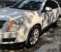 Cadillac SRX 2010 - Cần bán lại xe Cadillac SRX 2010, màu trắng