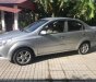 Chevrolet Aveo 2014 - Cần bán lại xe Chevrolet Aveo đời 2014, màu bạc số tự động, giá 330tr