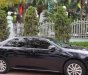 Toyota Camry 2.0E  2014 - Bán ô tô Toyota Camry 2.0E sản xuất năm 2014, màu đen, giá 788tr