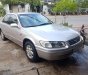 Toyota Camry GLi 2000 - Bán Toyota Camry GLi 2000, màu bạc xe gia đình