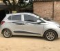 Hyundai Grand i10 2016 - Chính chủ bán Hyundai Grand i10 sản xuất 2016, màu bạc