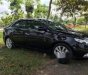 Kia Forte MT 2011 - Cần bán gấp Kia Forte MT năm 2011, màu đen chính chủ, giá 360tr