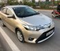 Toyota Vios 1.5E 2014 - Bán Toyota Vios 1.5E đời 2014, màu vàng số sàn, 415 triệu