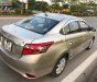 Toyota Vios 1.5E 2014 - Bán Toyota Vios 1.5E đời 2014, màu vàng số sàn, 415 triệu