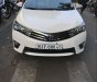 Toyota Corolla   2016 - Bán xe Toyota Corolla năm 2016, màu trắng như mới, giá 650tr