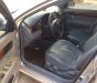 Daewoo Lacetti 2009 - Bán Daewoo Lacetti đời 2009, màu bạc số sàn