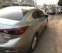 Mazda 626 2015 - Cần bán gấp Mazda 626 đời 2015, màu vàng còn mới, giá tốt