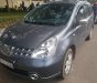 Nissan Grand livina   2010 - Cần bán Nissan Grand livina năm 2010, màu xám, xe gia đình 