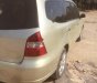 Nissan Grand livina 1.8 AT 2010 - Bán Nissan Grand livina 1.8 AT 2010, màu vàng số tự động