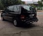 Kia Carnival GS 2.5 MT 2006 - Bán Kia Carnival GS năm 2006, màu đen, động cơ, hộp số hoạt động ổn định, gầm bệ chắc chắn