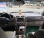 Kia Carnival 2006 - Cần bán lại xe Kia Carnival năm 2006 màu đen, giá tốt nhập khẩu