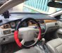 Mitsubishi Lancer 2.0 AT 2005 - Cần bán gấp Mitsubishi Lancer 2.0 AT sản xuất năm 2005, màu đen  