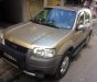 Ford Escape 3.0 V6 2004 - Cần bán xe Ford Escape 3.0 V6 đời 2004, màu vàng