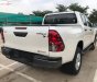 Toyota Hilux 2.4E 4x2 AT 2019 - Cần bán xe Toyota Hilux 2.4E 4x2 AT đời 2019, màu trắng, nhập khẩu 