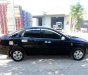 Daewoo Lacetti EX 1.6MT 2010 - Cần bán lại xe Daewoo Lacetti EX 1.6MT sản xuất 2010, màu đen số sàn, giá 275tr