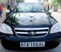 Daewoo Lacetti EX 1.6MT 2010 - Cần bán lại xe Daewoo Lacetti EX 1.6MT sản xuất 2010, màu đen số sàn, giá 275tr