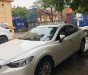 Mazda 6 2.0 AT 2015 - Cần bán Mazda 6 2.0 AT sản xuất 2015, màu trắng số tự động