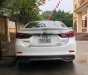 Mazda 6 2.0 AT 2015 - Cần bán Mazda 6 2.0 AT sản xuất 2015, màu trắng số tự động