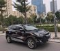 Hyundai Tucson   2009 - Cần bán Hyundai Tucson đời 2009, màu đen, giá tốt