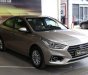 Hyundai Accent 1.4MT 2018 - Cần bán xe Hyundai Accent 1.4MT sản xuất năm 2018, màu ghi vàng, giá cạnh tranh