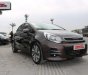 Kia Rio  1.4AT   2015 - Cần bán xe Kia Rio 1.4AT 2015, màu nâu, xe nguyên bản