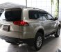 Mitsubishi Pajero Sport 2.5MT 2015 - Cần bán Mitsubishi Pajero Sport 2.5MT 2015, màu ghi vàng, giá 646tr