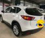 Mazda CX 5 2014 - Cần bán lại xe Mazda CX 5 sản xuất 2014, màu trắng, giá 719tr