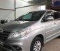 Toyota Innova  2.0E 2014 - Cần bán lại xe Toyota Innova 2.0E đời 2014, màu bạc, nhập khẩu như mới