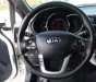 Kia Rio 1.4AT 2015 - Cần bán gấp Kia Rio 1.4AT đời 2015, màu trắng, xe nhập 